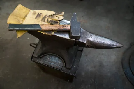 Brass, black iron, patina